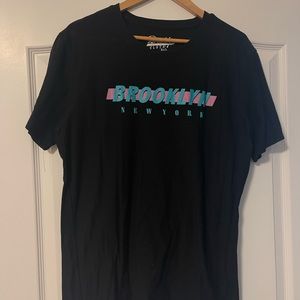 Brooklyn Black Tee with Blue and Pink Font Featuring Brooklyn New York